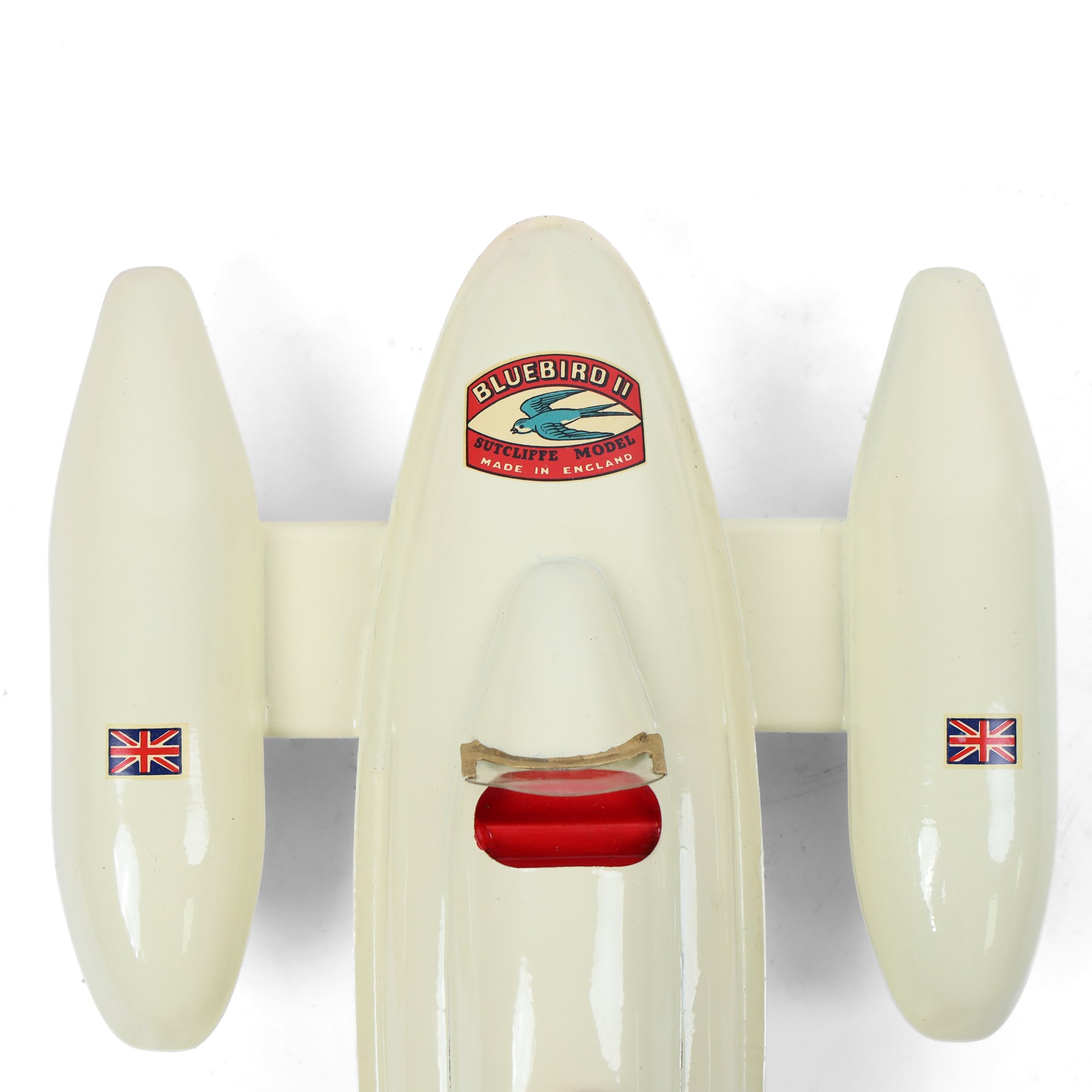 Sutcliffe Models tinplate clockwork 'Bluebird' speedboat, in red and cream livery with metallic gold details and applied decals, with key, boxed