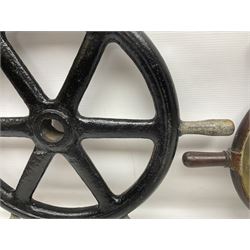 Brass bound teak ship's wheel with six turned spokes and brass hub, together with metal ship's wheel with six spokes, painted black with gilt spokes, largest D53cm