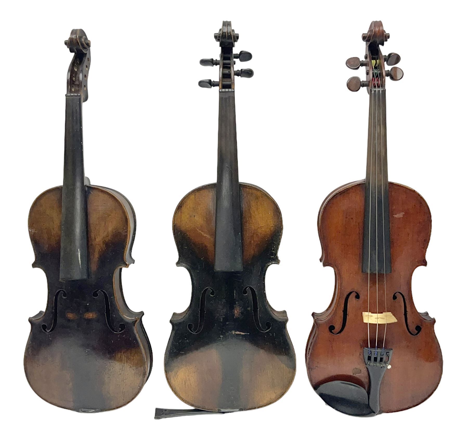 German violin c1890 with 36cm two-piece maple back and ribs and spruce top; bears label 'Antonius Stradivarius Cremona Faciebat Anno 1729' L59.5cm overall; in ebonised wooden 'coffin' case; and two German violins c1890 for completion - one bearing a Stradivarius label, the other a Ruggeri label; both in carrying cases (3)