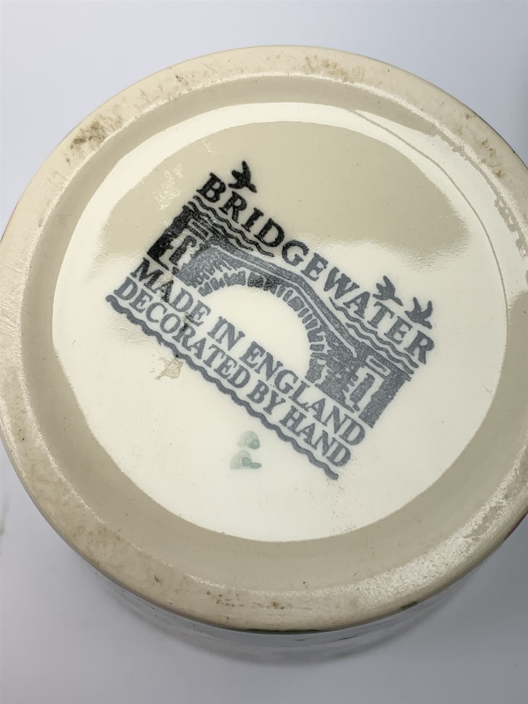 Four Emma Bridgewater mugs, together with a jug, and preserve pot and cover, decorated in sweet pea pattern, mugs H7cm. (5). 