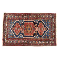 Persian Qashqai rug, wool on cotton foundation, triple stepped lozenge medallions with sty...