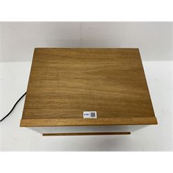 Dolls house scale room setting of a public house bar with tiled floor and beam and plaster ceiling and walls, bench seat, stools and table set out with a meal and drinks, large planked finish canted bar well stocked with food, drinks, bottles, glasses etc and bartender figure behind; electrically illuminated with sliding perspex access panel to front W38cm D28cm H24cm