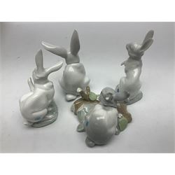 Four Lladro rabbit figures, comprising, Hippity Hop no 5886, Sitting Bunny no 5907, Washing up no 5887, and Rabbit Eating no 4773, largest example 14cm  