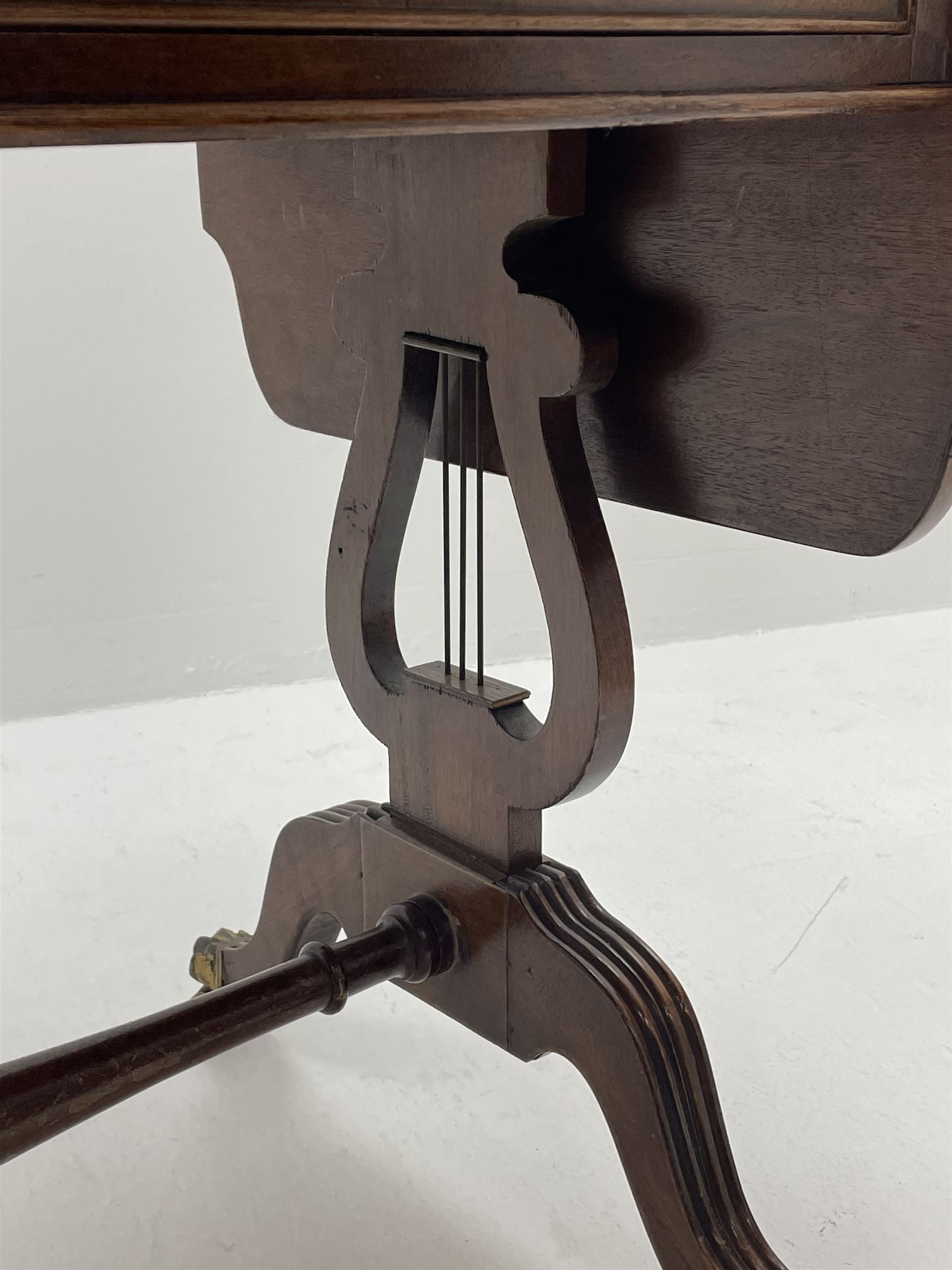 20th century walnut drop leaf sofa table, shaped drop leaf top over two drawers, on lyre shaped end pillars with splayed reeded supports joined by turned stretcher