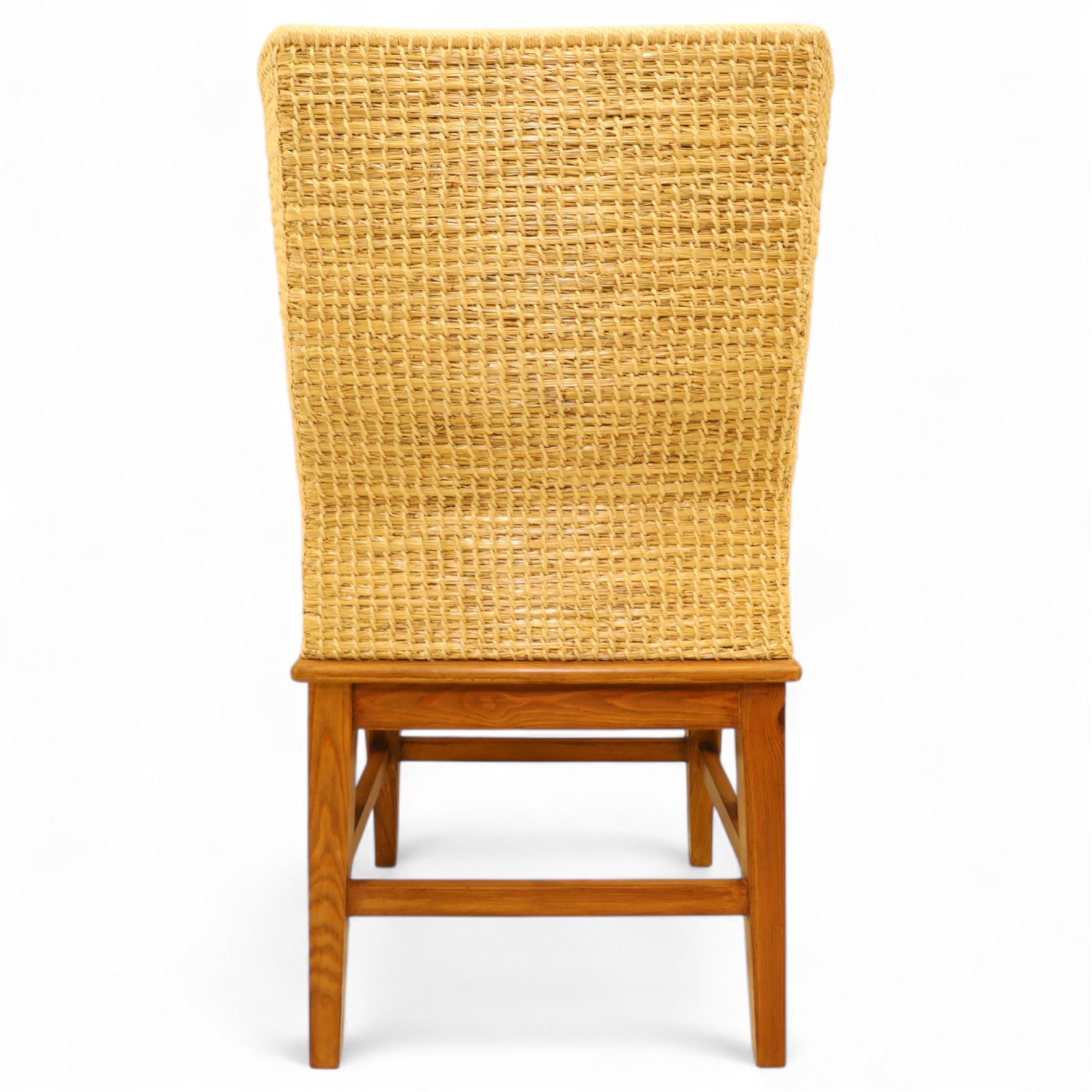 Pair of 20th century full-size pine Orkney chairs, high-back armchairs of traditional design, pegged and wedged construction, wrap-around backrest and sides, above scrolled out-swept arms and solid rounded pine seat, raised on square tapering legs united by stretchers, hand-signed ‘Jackie Miller’ and stamped ‘Orkney’
