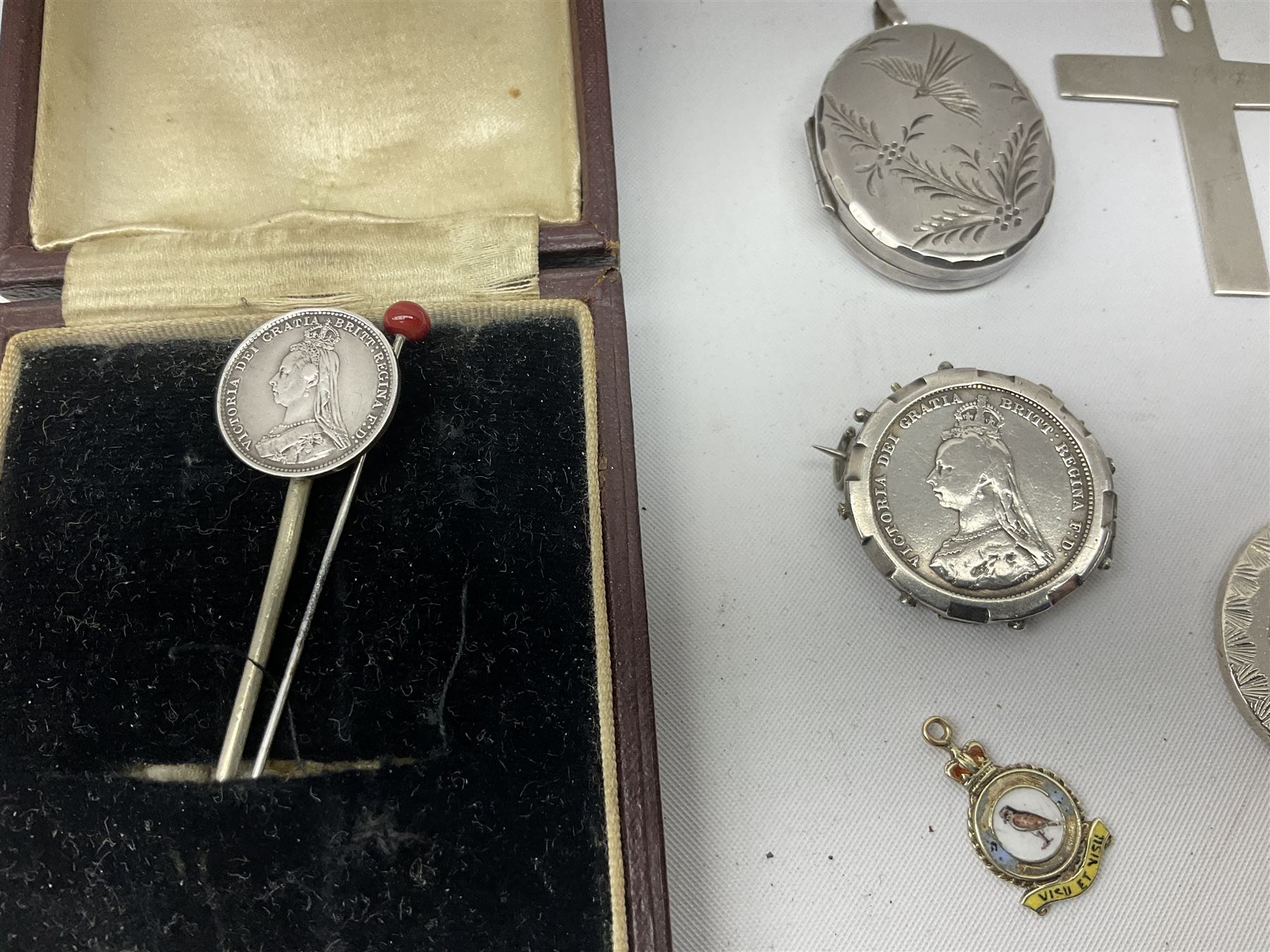 Modern silver locket, modern silver circular pendant, modern silver cross shaped pendant, small 9ct gold and enamel pendant, etc., approximate gross silver weight 40 grams, approximate gold weight 1.3 grams