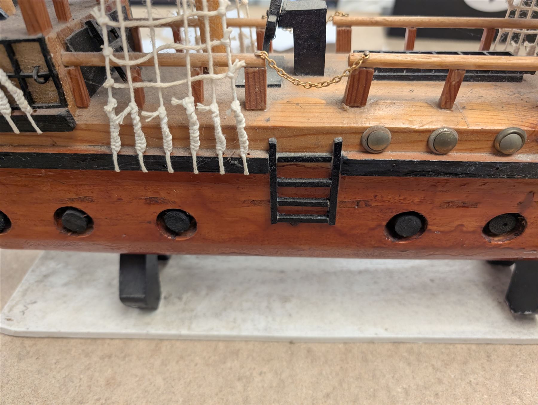 Wooden model ship 'Mayflower', together with a similar smaller example, largest H56cm