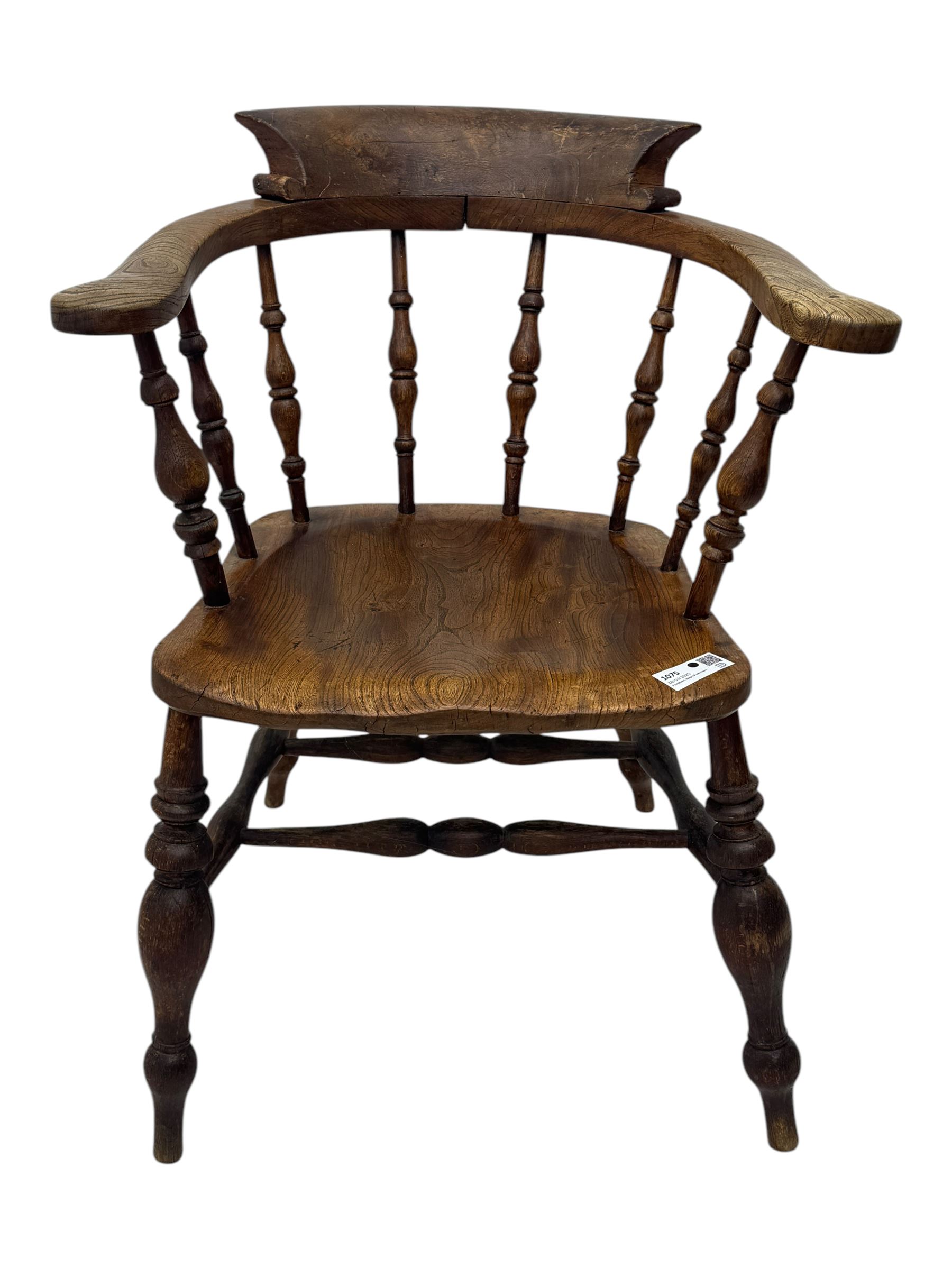 19th century elm and beech smoker's bow armchair, shaped arms over turned spindle gallery and dished seat, on turned supports united by double H-shaped swell turned stretchers 