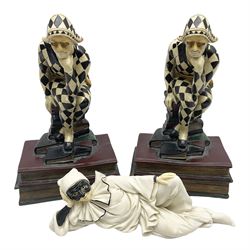 Pair of early-mid 20th century figural composite bookends modelled as harlequin court jesters sat upon stacks of books, H20cm together with a figure of a jester signed Vivian C (3)