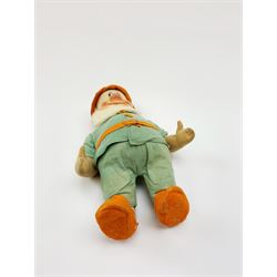 Chad Valley pressed felt figure of the Disney Snow White dwarf 'Doc' with painted facial features, standing wearing a green linen suit with orange hat, belt, buttons and shoes H13