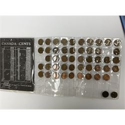 Mostly Canadian coins including 1967 six coin set, various Canadian 50 cent coins, various nickels, Royal Canadian Mint 1990 specimen coin set in blue folder with outer sleeve, various Canadian dollars etc, in folders and loose