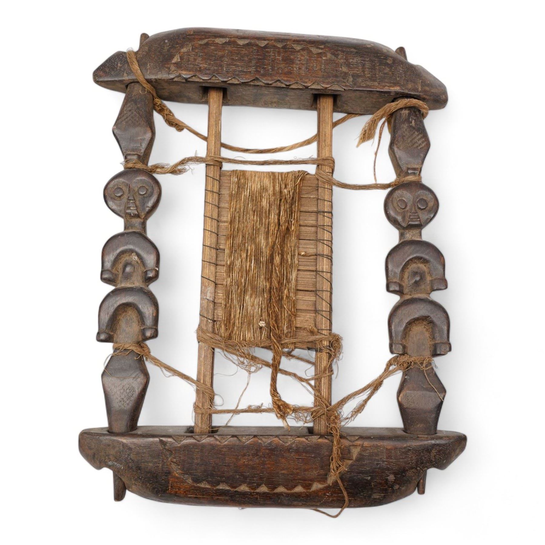 African Colonial carved hardwood staff finial, the male figure in military dress, L66cm, African Fang weaving tool and a woven basket (3)