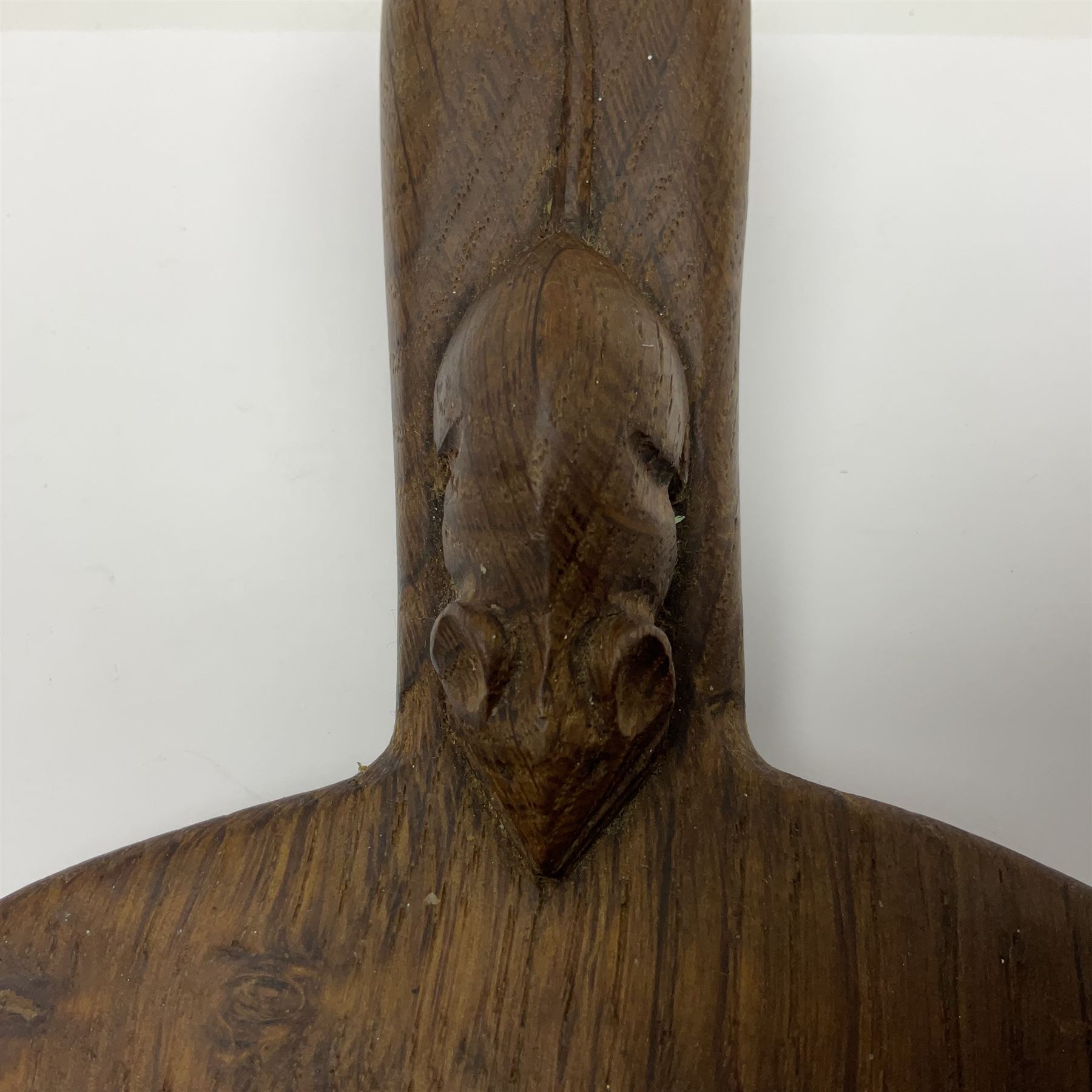 Mouseman - oak kidney-shaped cheeseboard, the handle caved with mouse signature, by the workshop of Robert Thompson, Kilburn 
