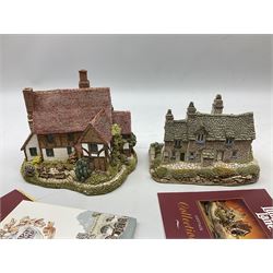 Nine Lilliput Lane cottages from the British and English collections to include Crown Inn, Wealden House, Puffin Row, etc, all boxed, one without deeds