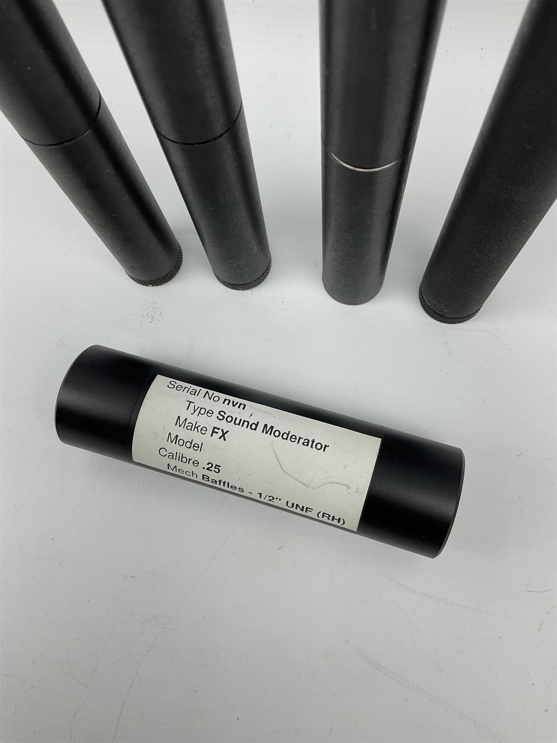 Four Parker-Hale .22 moderators and an FX  .25 air rifle moderator SHOTGUN CERTIFICATE REQUIRED