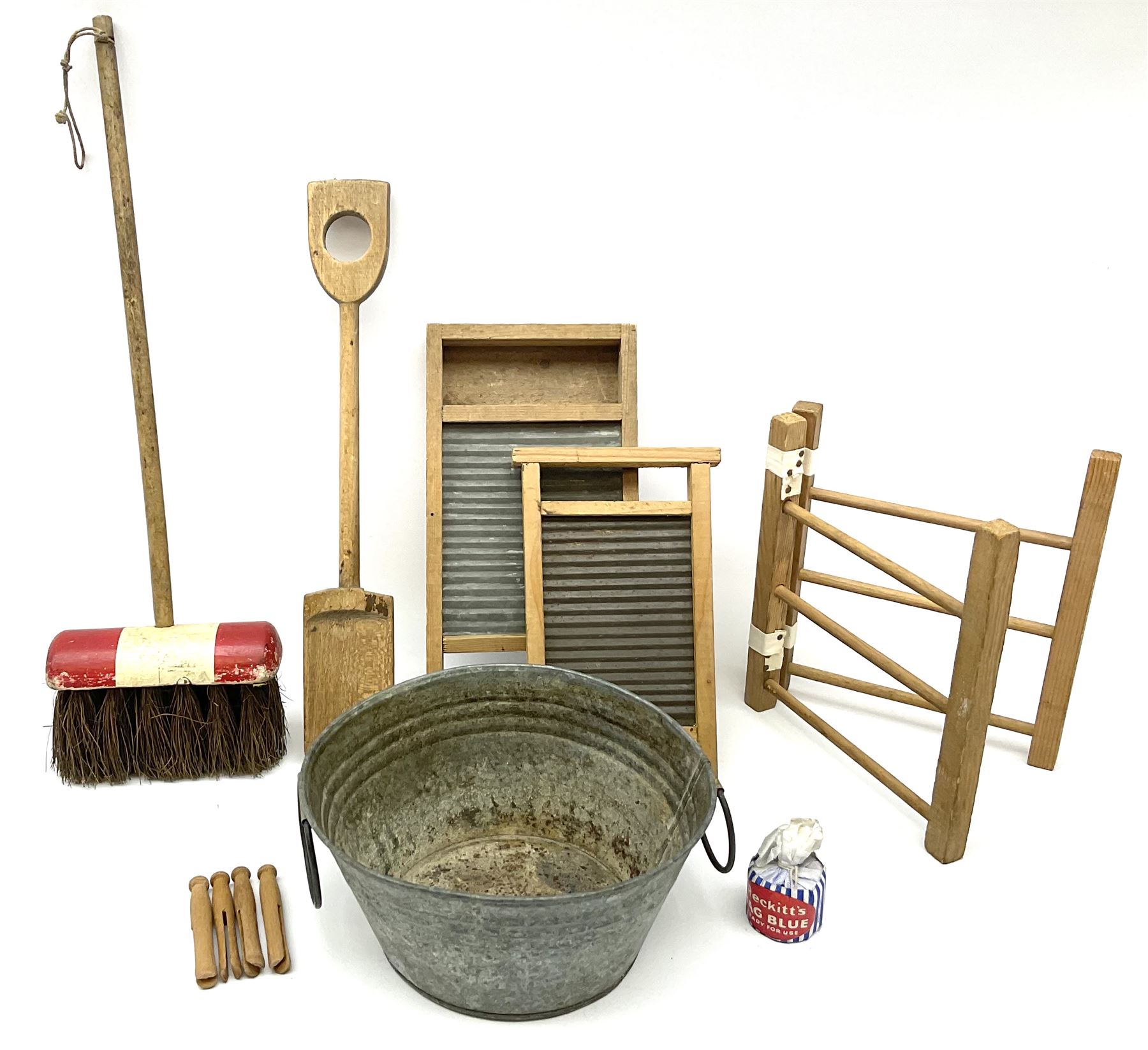 Vintage wooden toys including laundry set of washboards, clothes horse and tin wash-tub; scratch-built vehicles; building blocks; toy sweeping brush; skittles; spade; 'Titanic' deck chair; bee hive etc