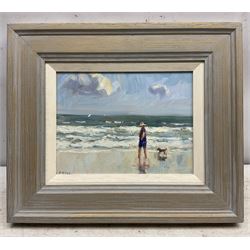 Christine M Pybus (British 1954-): Figure and Dog on the Beach, oil on board signed 15cm x 20cm