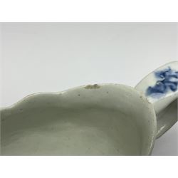 Large 18th century Lowestoft sauce boat, circa 1770, the body decorated with Hughes type floral moulding, and painted in underglaze blue with an Oriental landscape, and foliate sprigs, L23cm