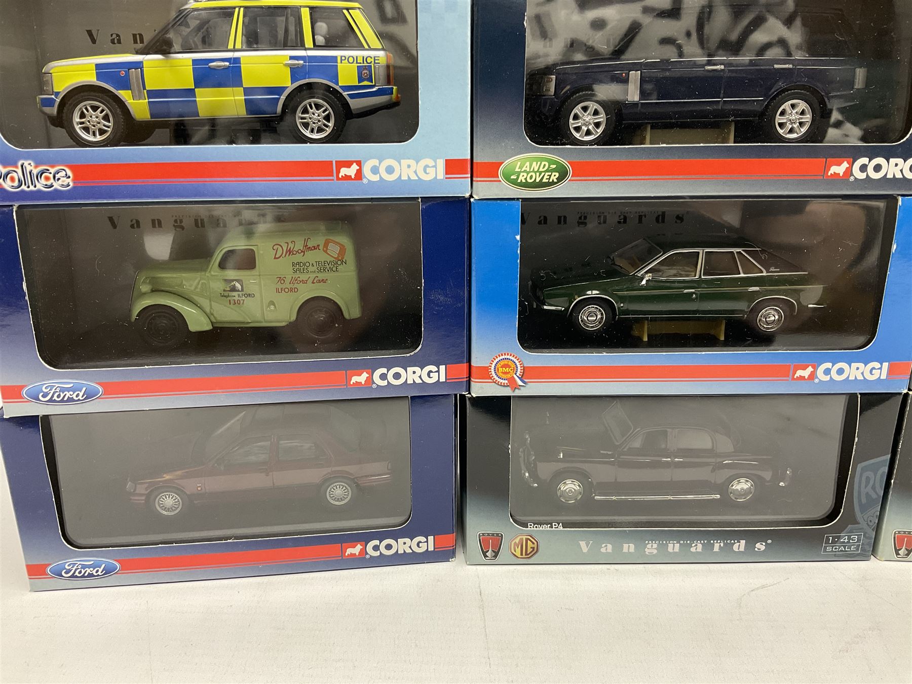Lledo and Vanguard 1:43 scale die-cast models including Land Rover, Vauxhall, MG, Police and others, all boxed (21)