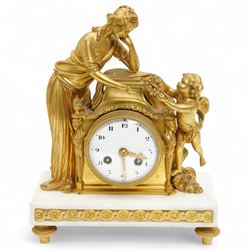 French-Fine late 19th century gilded bronze ormolu 8-day mantle clock on a rectangular whi...