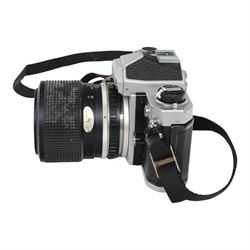 Two Nikon FM camera bodies, comprising Nikon FM serial no. 3239117, with a Nikon Series E 36-72mm 1:3.5 zoom lens and a Nikon FM2 serial no. 7141741, with a Nikkor 50mm 1:1.8 lens and a Nikon Series E 70-210mm 1:4 zoom lens