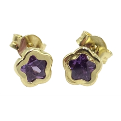  Pair of gold amethyst star stud earrings, stamped 9K  