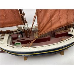 Wooden model of the Peterhead Herring Fishing Boat, Love Divine, PD404. on stand together with Wick Herring Fishing Boat, Galilee WK.1. on stand, L105cm, H64cm