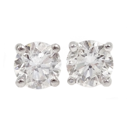  Pair of 18ct white gold diamond stud earrings, stamped 750, diamonds approx 1 carat  