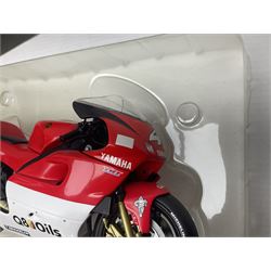 Three Minichamps 1:12 scale die-cast motorcycles - Yamaha YZR 500 Max Biaggi 2000; Yamaha YZR-M1 Colin Edwards Fiat Yamaha Team MotoGP 2007 GP Australia; and Yamaha YZR 500Team Yamaha Max Biaggi 500ccGP 2001; all boxed (3)