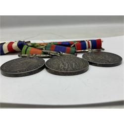 WW2 group of five medals comprising 1939-1945 War Medal, Defence Medal, 1939-1945 Star, France and Germany Star and Canadian Volunteer Service Medal; on wearing bar with ribbons; with a medal box and slip and three photographs