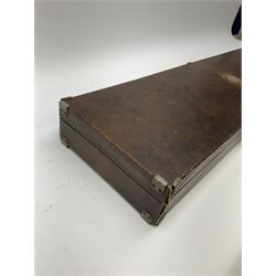 Rexine covered oak shotgun case with baize lined fitted interior to accommodate 74cm barrels, white metal plaque to lid monogrammed DMB, L82cm overall