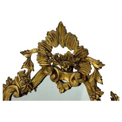 18th century design gilt framed wall mirror, within a pierced and scrolling foliate frame, leaf sprays and flowerhead cresting