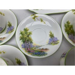 Aynsley Bluebell Time 'As Supplied to the Queen' tea service, comprising hot water jug, six teacups and saucers, milk jug, two cake plates and tow trinket dishes  