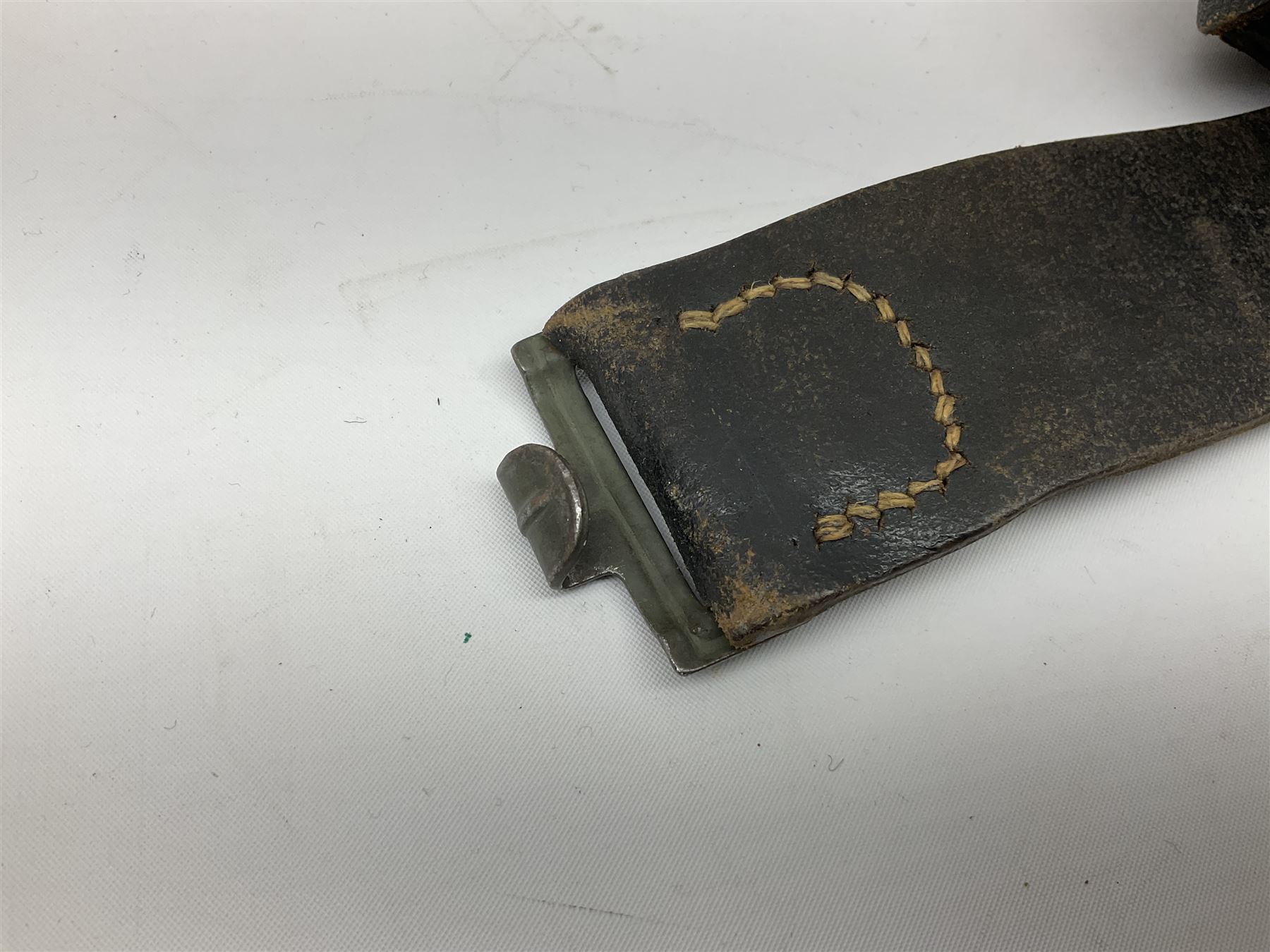 WW2 German 'SS' leather belt with six pouches (one containing unused field bandage) and buckle inscribed 'Meine Ehre Heifst Treue'; belt marked 0/0836 0029