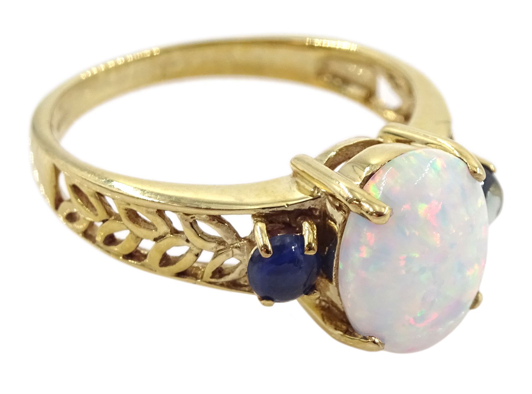 9ct gold three stone opal and sapphire ring, hallmarked