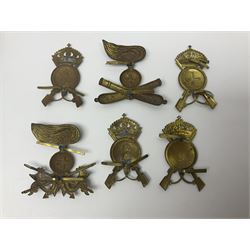 Over thirty British and Continental military metal badges; together with quantity of shoulder titles, collar dogs, rank pips, uniform buttons etc