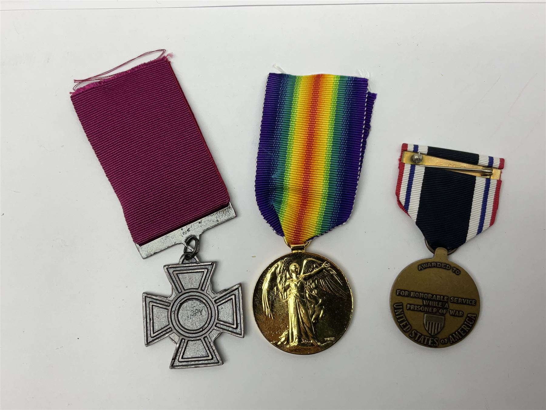 Gaunt & Son Territorial Force Nursing Service cape medal; cased; WW1 British War Medal and 1914-15 Star (names erased); two MID oak leaves; Polish and American medals; eight replica medals including VC, MM, Air Crew Europe Star etc and replica group of five WW2 miniatures etc