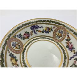 Sèvres soft paste porcelain coffee can and saucer with date code for 1780, painted with pink oval panels bordering bouquets of flowers, united by swags of flowers tied with purple ribbons, within laurel leaf borders, interlaced LL monogram enclosing date letters CC above painters marks for Nicquet, coffee can H7.5cm, saucer D15cm