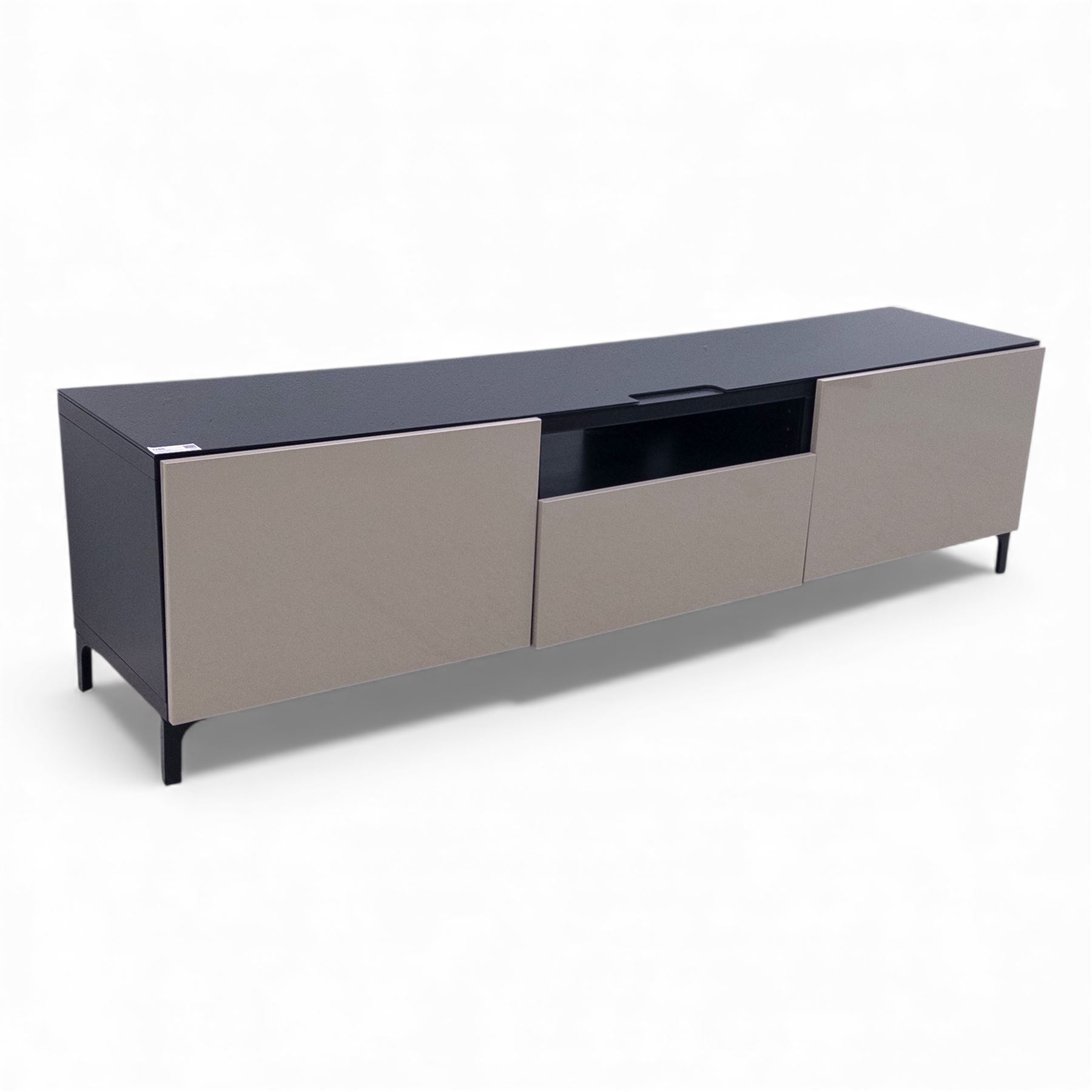IKEA - contemporary black and beige low media unit, rectangular form with high-gloss black top and beige panelled doors, fitted with central open shelf and twin cupboards, push to open doors and drawers, raised on short bracket feet