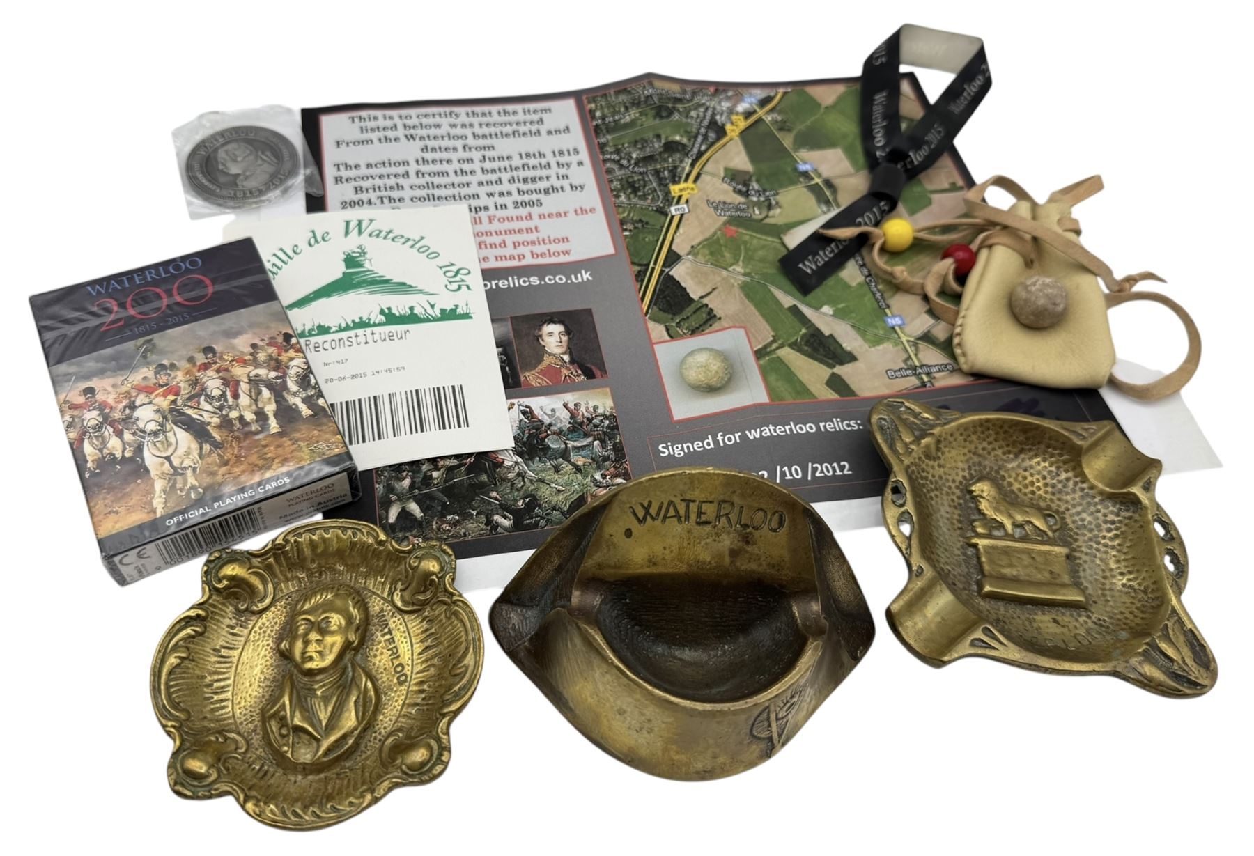 Waterloo Relics musket ball from the Waterloo battlefield with printed certificate, together with Waterloo brasses etc