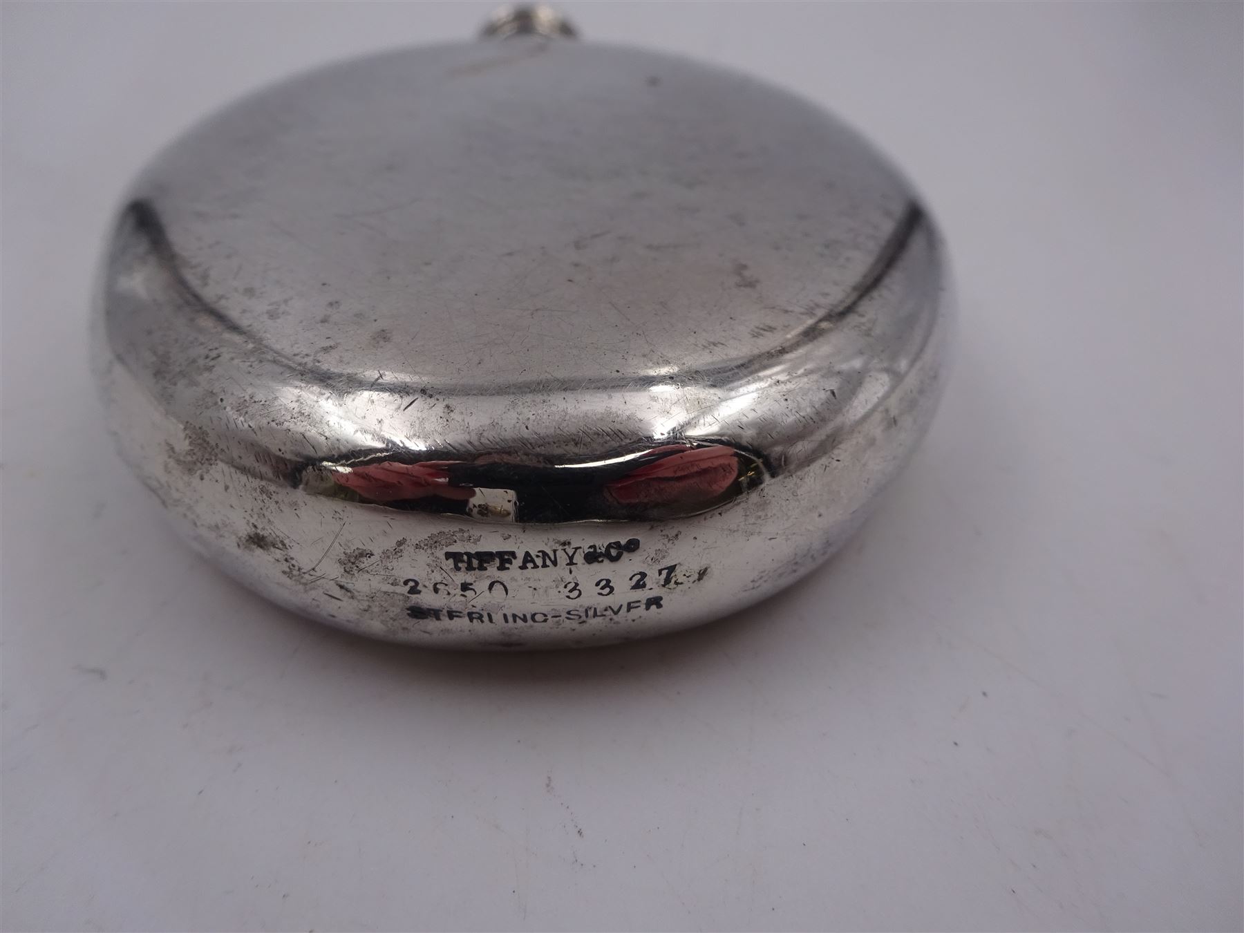 Tiffany & Co silver hip flask, of oval form with screw cap, stamped Tiffany & Co  26503327 Sterling Silver beneath, H11.5cm