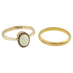Gold single stone opal ring, stamped 9ct and a gold wedding band, hallmarked 22ct