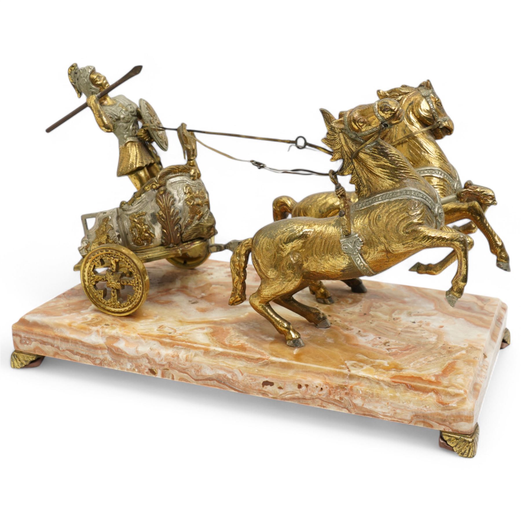 Gilt metal model depicting Roman charioteer and two horses, on marble base W38cm 