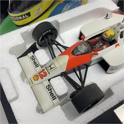 Ayrton Senna Racing Car Collection - McLaren MP4/4 1988 World Champion; boxed; with separate stand titled 'First Championship'