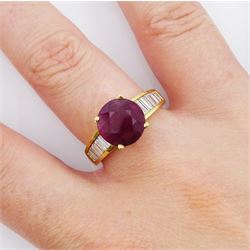 18ct gold ruby and diamond ring, single round cut ruby of approx 3.25 carat, with channel set baguette cut diamond shoulders, total diamond weight approx 0.85 carat