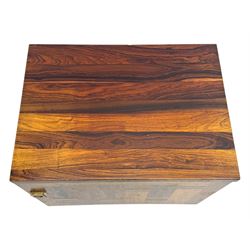 Troeds of Sweden - mid-20th century rosewood veneered cupboard, single door with brass handle enclosing interior fitted with one drawer, raised on ebonised tapered and splayed supports