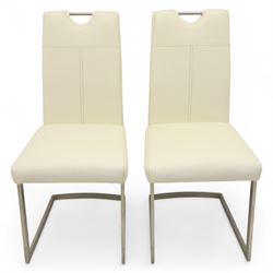 Set of seven contemporary style dining chairs, each with a high padded back and seat upholstered in faux leather on brushed steel sled bases  