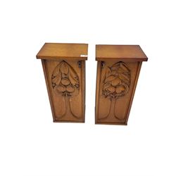 Pair Arts & Crafts carved oak cupboards, enclosed by door relief carved with stylised orange tree, each fitted with two shelves