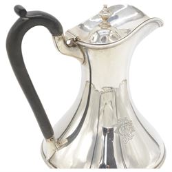 1930s silver hot water pot, of bellied form engraved with monogram to body, with Bakelite type handle and urn finial, hallmarked Fattorini & Sons Ltd, Birmingham 1938, H23cm