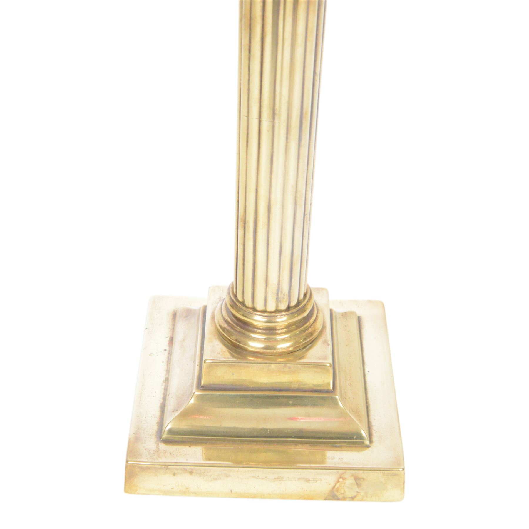 Victorian brass oil lamp, the Corinthian column supporting a cranberry glass burner and opaque etched cranberry glass shade and clear glass chimney, overall H77cm